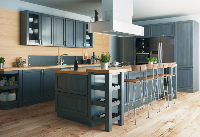 Modern kitchen remodel featuring dark blue cabinets and island Modern kitchen remodel featuring dark blue cabinets and island