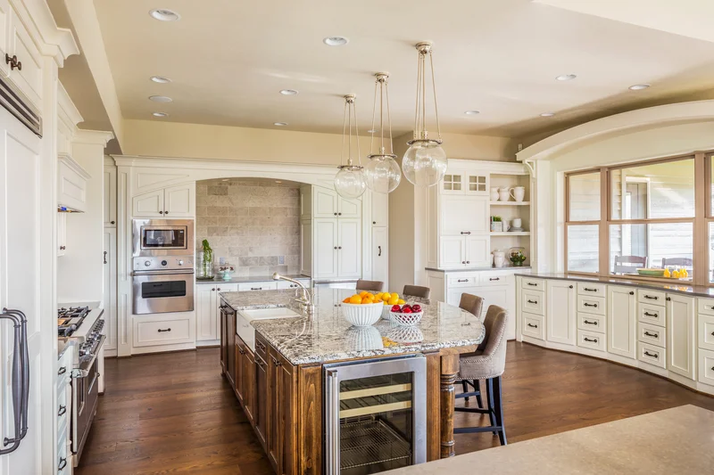 Modern remodeled kitchen with white cabinets and custom wood island Modern remodeled kitchen with white cabinets and custom wood island