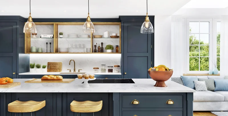 Elegant navy blue kitchen remodel with marble countertops and gold accents. Elegant navy blue kitchen remodel with marble countertops and gold accents.